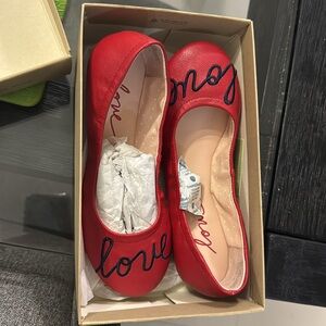 Vibrant Red Flats with Love Detail